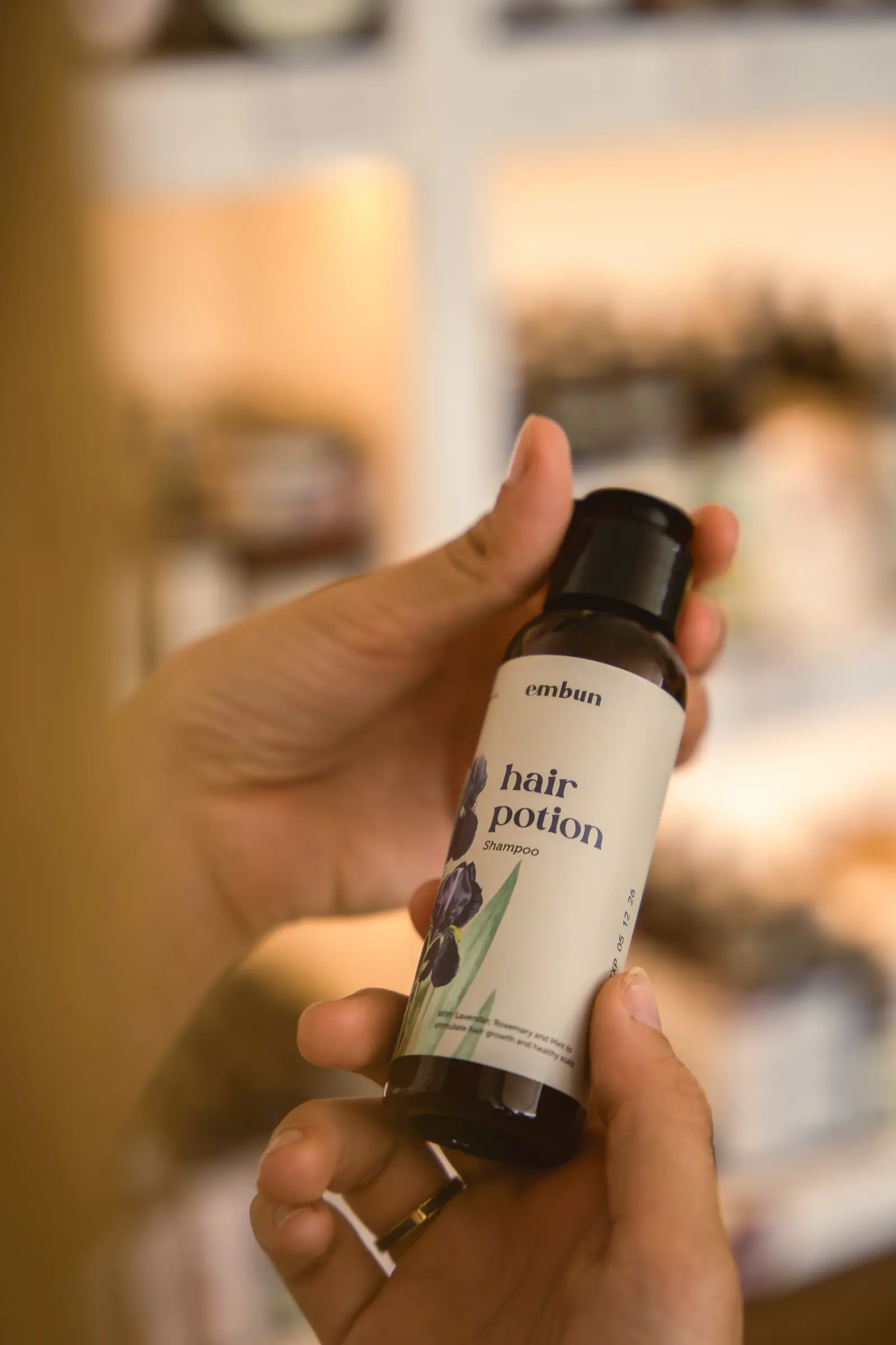 A guest reading the Embun label