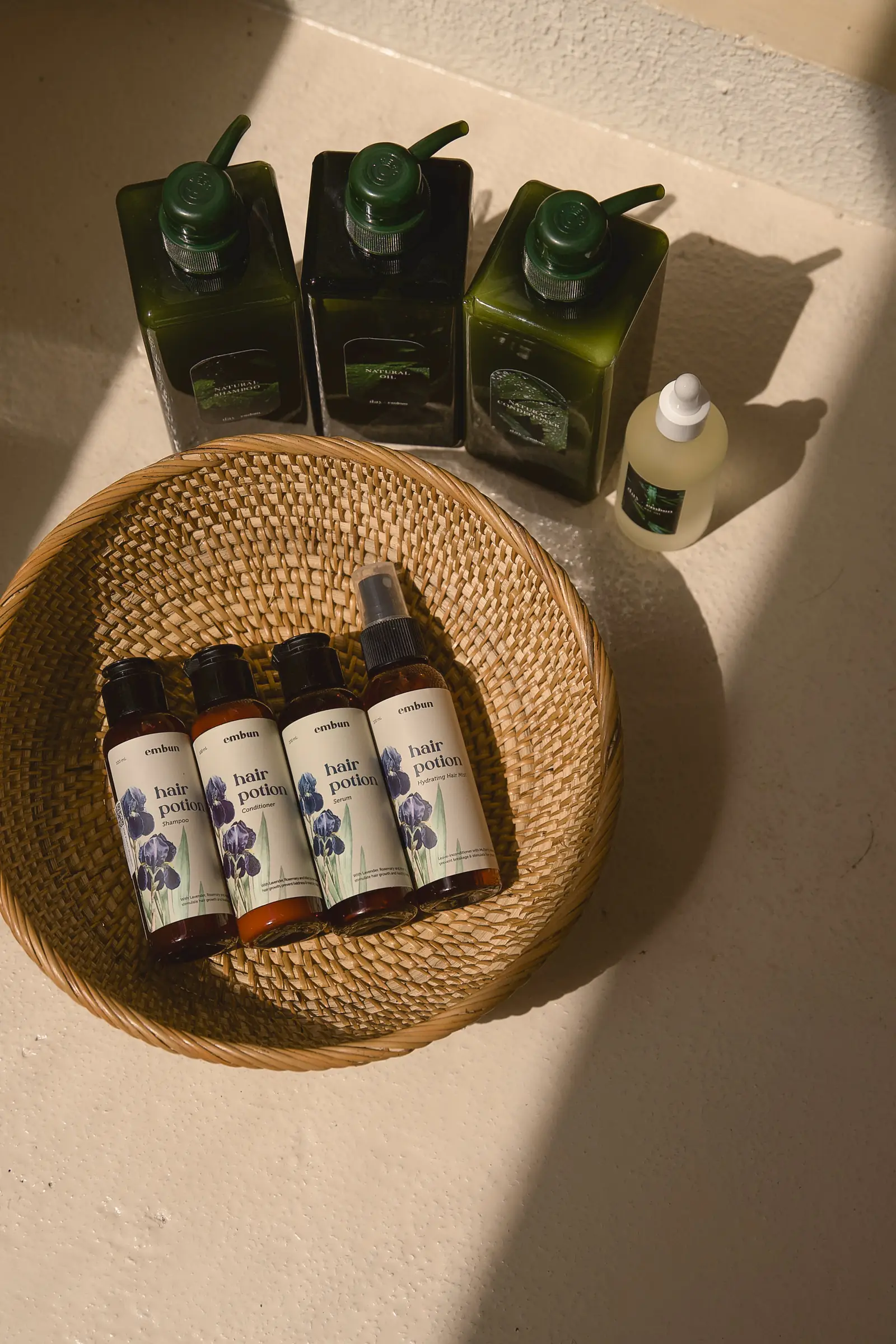 The Embun Natural range at Day Hair Habit: hair potion shampoo, conditioner, serum and hydrating mist, with natural shampoo, conditioner and hair oil