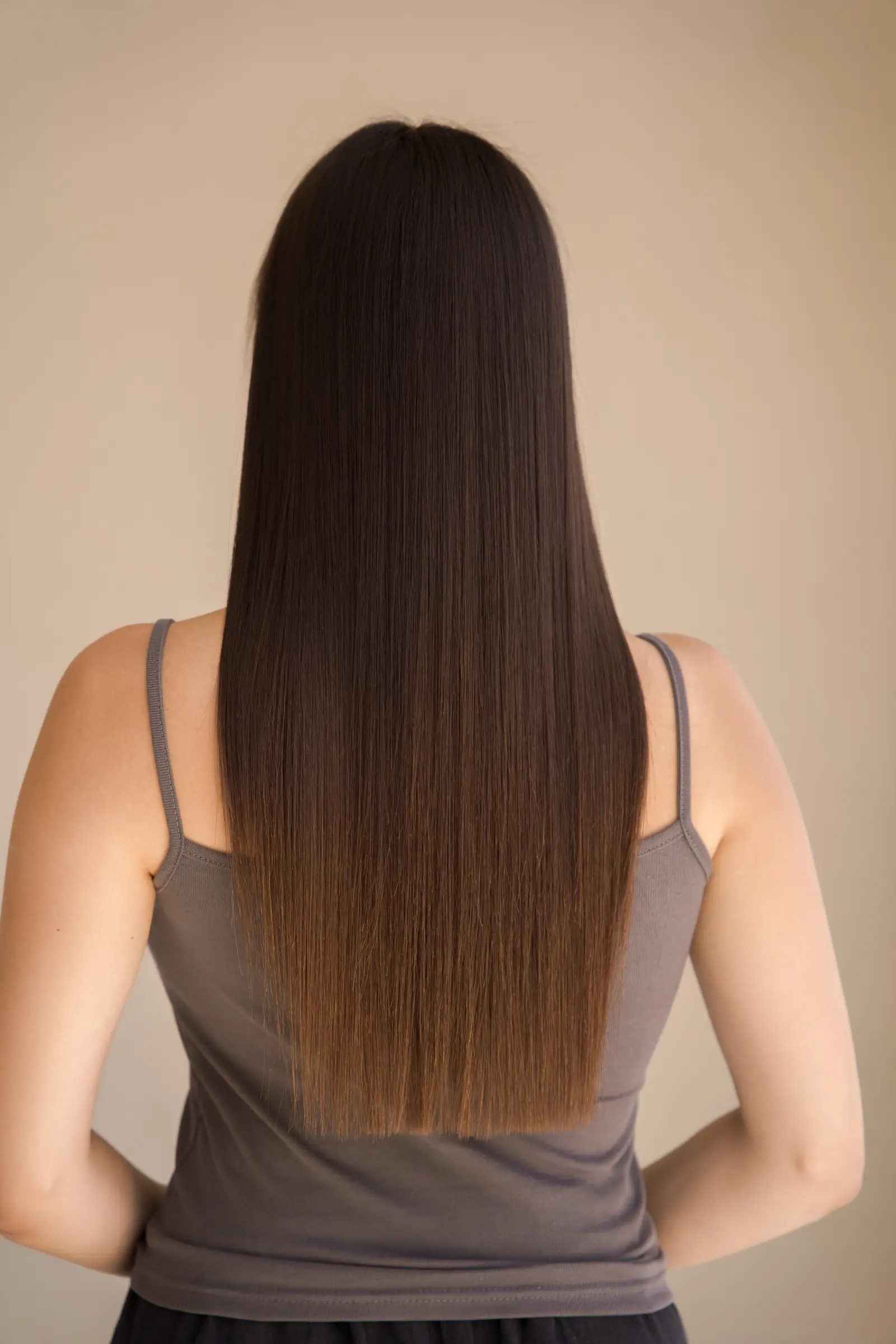 Long hair left smooth and glossy by a Signature Day Keratin treatment