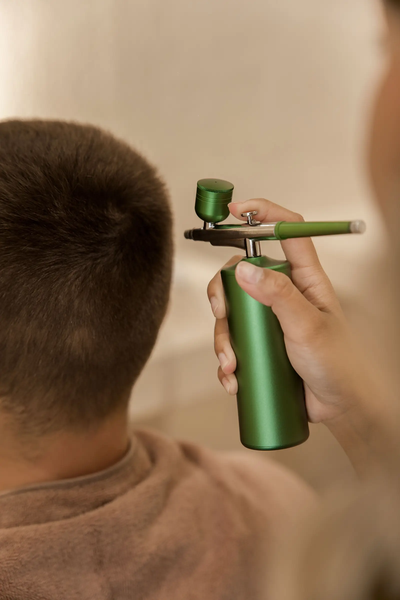 Scalp mist applied during a natural treatment